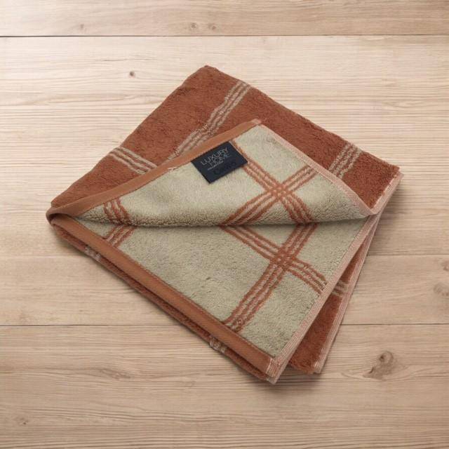 Cawö Frottiertuchserie Two-Tone Grafik 604 Kupfer Handtuch 50 x 100 cm